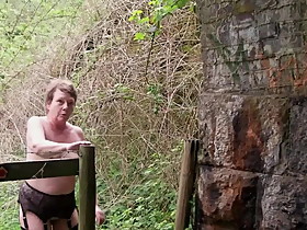 Slut Walk in the Countryside in Stockings Suspenders & Boots
