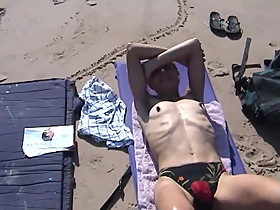 wife topless on beach