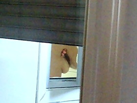Wife showering through the window spy