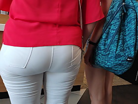 Candid delicious ass milfs in tight white jeans at Mcdonalds