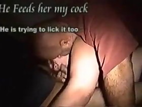 Husband and wife suck a cock together